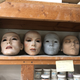 Molds in Tanya Wolf Ragir’s studio of various mannequin masks. One on the right is a mask of Meshach Taylor, made for the Mannequin sequel. The one on the far left is Bill Paxton.